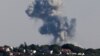 গাজার উত্তরাঞ্চলে ইসরায়েলি বাহিনীর নতুন হামলার পরে ধোঁয়ার কুণ্ডলী উঠতে দেখা যাচ্ছে। ফটোঃ ১২ মে, ২০২৪। 