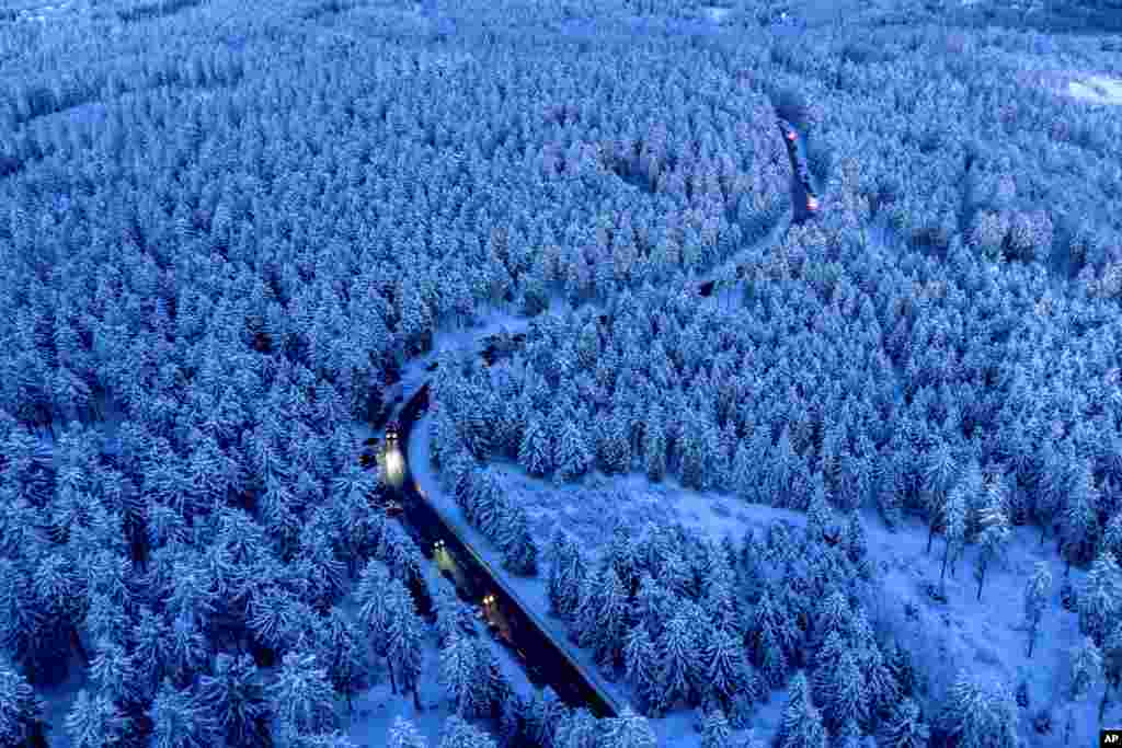Cars drive up to the top of the Feldberg mountain near Frankfurt, Germany.