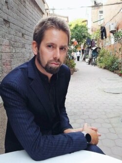 This undated photo at an undisclosed location provided to AFP by the "Chinese Urgent Action Working Group" shows Swedish human rights activist Peter Dahlin.