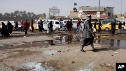 Lapangan Adan di Ibu Kota Irak, Baghdad setelah serangan bom bunuh diri, 9 Februari 2015. Serangan bom bunuh diri terjadi kembali di Lapangan Adan, Sabtu, 13 Januari 2018.