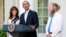 U.S. President Barack Obama stands with Bob Bergdahl (R) and Jami Bergdahl (L) as he delivers a statement about the release of their son, prisoner of war U.S. Army Sergeant Bowe Bergdahl, in the Rose Garden at the White House in Washington May 31, 2014.