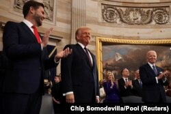 Izabrani potpredsjednik SAD-a, bivši senator J. D. Vance i izabrani predsjednik SAD-a Donald Trump tokom ceremonije inauguracije, 20. januar 2025.