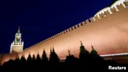 FILE - A general view shows the Spasskaya Tower and the Kremlin wall in central Moscow, Russia, May 5, 2016.