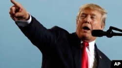 U.S. President Donald Trump an event at the Harrisburg International Airport in Middletown, Pennsylvania, Oct. 11, 2017. 