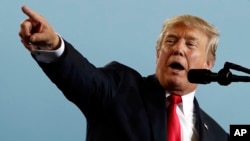 FILE - U.S. President Donald Trump an event at the Harrisburg International Airport in Middletown, Pennsylvania, Oct. 11, 2017. 