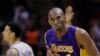FILE - Los Angeles Lakers' Kobe Bryant (24) celebrates after he scored against the San Antonio Spurs during the second half of an NBA basketball game.