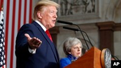 President Donald Trump speaks during a news conference with British Prime Minister Theresa May at the Foreign Office, June 4, 2019, in central London.