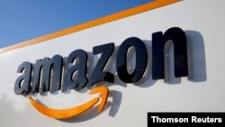 电商巨头亚马逊（Amazon.com)商标。（路透社/Thomson）