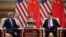 U.S. Secretary of State John Kerry (L) speaks with China's President Xi Jinping at the Great Hall of the People at the end of the 8th round of U.S.-China Strategic and Economic Dialogues in Beijing, June 7, 2016. 