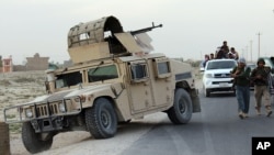 Afghanistan's security forces patrol of Kunduz city, north of Kabul, Afghanistan, Sept. 29, 2015. 
