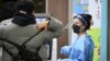 South Korean Test Takers Gather as Infection Rates Grow