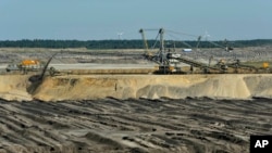 The Welzow-Sued open-pit coal mine, 70 miles south of Berlin, is one of several in eastern Germany’s Lusatia region. It is expected to expand in the coming years and consume the village of Proschim, just over a mile away.
