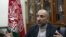 FILE - Then-Afghan National Security Adviser Mohammad Hanif Atmar speaks during an interview in Kabul, Oct. 24, 2015.