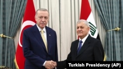 سەرۆکی عێراق عەبدول لەتیف ڕەشید و سەرۆکی تورکیا ڕەجەب تەیب ئەردۆغان، بەغدا 22ی چواری 2024