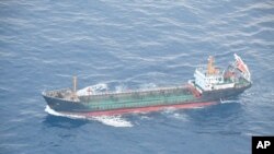Photo released by Japan's Ministry of Defense shows North Korean-flagged tanker Ji Song 6 in the East China Sea, May 19, 2018, suspected of fuel transports that violate international sanctions.