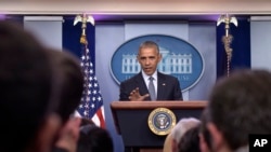 Presiden AS Barack Obama dalam konferensi pers di Gedung Putih (14/11). (AP/Susan Walsh)