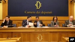 (L-R) Italian radical party lawmaker Riccardo Maggi, Mark Rozzi, Dem. member of Pennsylvania House of Representatives, Italian sex abuse survivor Francesco Zanardi, Anne Barrett Doyle, of Bishop Accountability, and Tim Lennon, of SNAP, attend a press event, Rome, Feb. 21, 2019. 
