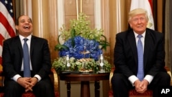 President Donald Trump jokes with Egyptian President Abdel Fattah el-Sisi during a meeting, May 21, 2017, in Riyadh. 