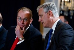 FILE - National Security Adviser Robert C. O'Brien (R) talks with White House chief of staff Mick Mulvaney during a meeting on the sidelines of the United Nations General Assembly, in New York, Sept. 23, 2019.