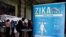 FILE - Material to prevent Zika infection by mosquitoes are displayed at the 69th World Health Assembly at the United Nations European headquarters in Geneva, Switzerland, May 23, 2016.