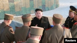 FILE - North Korean leader Kim Jong Un organizes and guides a combined joint drill in Pyongyang.