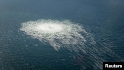 FILE - Gas bubbles from the Nord Stream 2 leak reaching surface of the Baltic Sea in the area shows disturbance of well over one kilometre diameter near Bornholm, Denmark, Sept. 27, 2022. Danish Defence Command/Handout via REUTERS 