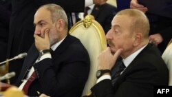 ՀՀ վարչապետ Նիկոլ Փաշինյանը և Ադրբեջանի նախագահ Իլհամ Ալիևը՝ 2024 թ-ի հոկտեմբերի 8, Մոսկվա, ԱՊՀ երկրների գագաթնաժողով (Լուսանկարը՝ AFP)