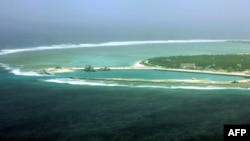 FILE - This file aerial view taken on July 27, 2012 shows part of the city of Sansha on the island of Yongxing, also known as Woody island in the disputed Paracel chain. (AFP PHOTO)