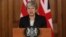 PM Inggris Theresa May memberikan pernyataan di kantornya di Downing Street, London, Rabu (20/3). 