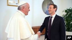 Pope Francis meets Facebook founder and CEO Mark Zuckerberg, at the Santa Marta residence, the guest house in Vatican City where the pope lives, Monday, Aug. 29, 2016. Vatican spokesman Greg Burke says a topic of discussion at Monday’s meeting was “how to use communication technologies to alleviate poverty, encourage a culture of encounter, and make a message of hope arrive, especially to those most in need.’’ (L'Osservatore Romano/Pool Photo via AP)