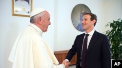 Pope Francis meets Facebook founder and CEO Mark Zuckerberg, at the Santa Marta residence, the guest house in Vatican City where the pope lives, Monday, Aug. 29, 2016.