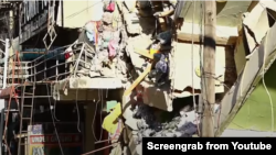 Un bâtiment effondré sur le marché de Kariakoo, Dar es Salaam, Tanzanie.