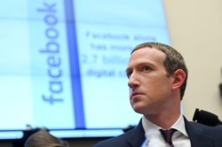 FILE - Facebook Chairman and CEO Mark Zuckerberg testifies at a House Financial Services Committee hearing in Washington, October 23, 2019.