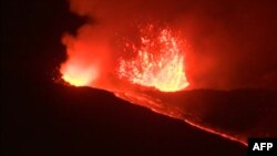 This videograb released by AFPTV shows Mount Etna, Europe's biggest active volcano, erupting, on May 31, 2019, near Catania, due to the opening of two eruptive fractures, according to the volcanologists of the Ingv Etna Observatory. 