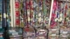 FILE - Foreign textile fabrics and materials are seen in a Nigerian shop, Dec. 5, 2012. (I. Kure/VOA)