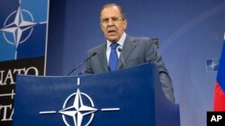 Rossiya tashqi ishlar vaziri Sergey Lavrov Bryusselda NATO-Rossiya kengashi majlisida, 4-dekabr, 2013-yil