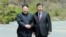 North Korean leader Kim Jong Un shakes hands with China's President Xi Jinping, in Dalian, China in this undated photo released on May 9, 2018 by North Korea's Korean Central News Agency (KCNA).