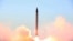 FILE - The Iranian Defense Ministry purports to have launched an Emad long-range ballistic surface-to-surface missile on Oct. 11, 2015. U.S. interests in the Iran nuclear deal are influencing the U.S. response to the crisis between Saudi Arabia and Iran, analysts say.