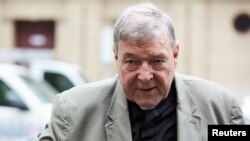 Cardinal George Pell arrives at the County Court in Melbourne, Australia, Feb. 26, 2019. 