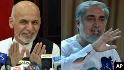 Ashraf G'ani (chapda) va Abdulla Abdulla, Kobul, 5-iyul, 2014 