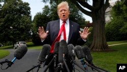 President Donald Trump speaks to the media on the South Lawn of the White House in Washington, May 23, 2018.