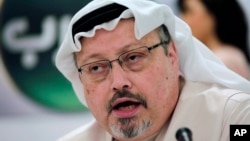 FILE - Saudi journalist Jamal Khashoggi speaks during a press conference in Manama, Bahrain, Feb. 1, 2015. A pro-government Turkish newspaper Wednesday published a gruesome recounting of the alleged slaying of Khashoggi at the Saudi Consulate in Istanbul