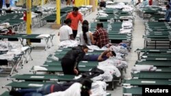 Para migran di fasilitas penahanan imigras AS di kota El Paso, Texas (foto: dok). 