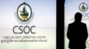 FILE - A man is silhouetted against a screen at the Cyber Security Operation Center in Bangkok.
