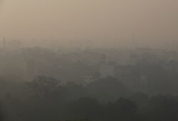 Buildings are seen shrouded in smog in New Delhi, India, Nov. 5, 2019.