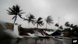 Street shops are seen collapsed because of gusty winds preceding the landfall of Cyclone Fani on the outskirts of Puri, in the Indian state of Odisha, May 3, 2019. 
