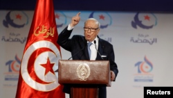 Le président tunisien Beji Caid Essebsi lors d'un discours devant le congrès du mouvement Ennahdha à Tunis, Tunisie, le 20 mai 2016.