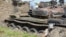 Tanks that have been destroyed during fighting between forces of Salva Kiir and Riek Machar, on July 10, 2016 in Jabel area of Juba, South Sudan, Saturday, July 16, 2016.