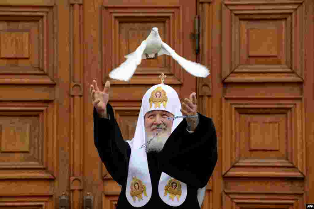 Russian Orthodox Patriarch Kirill releases a white dove to mark Annunciation Day in the Kremlin in Moscow. In Christianity, Annunciation celebrates the relevation to the Virgin Mary that she would bear a son, Jesus.