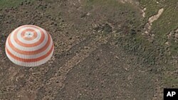 The Soyuz TMA-17 spacecraft carrying Expedition 23 Commander Oleg Kotov and Flight Engineers T.J. Creamer and Soichi Noguchi lands on the steppes of Kazakhstan, 02 Jun 2010
